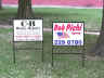 Photo of two 18x24 real estate style signs in black iron frames. File name=
rs002.jpg (309144 bytes)