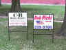 Photo of two 18x24 real estate style signs in black iron frames. File name=
rs002.jpg (309144 bytes)